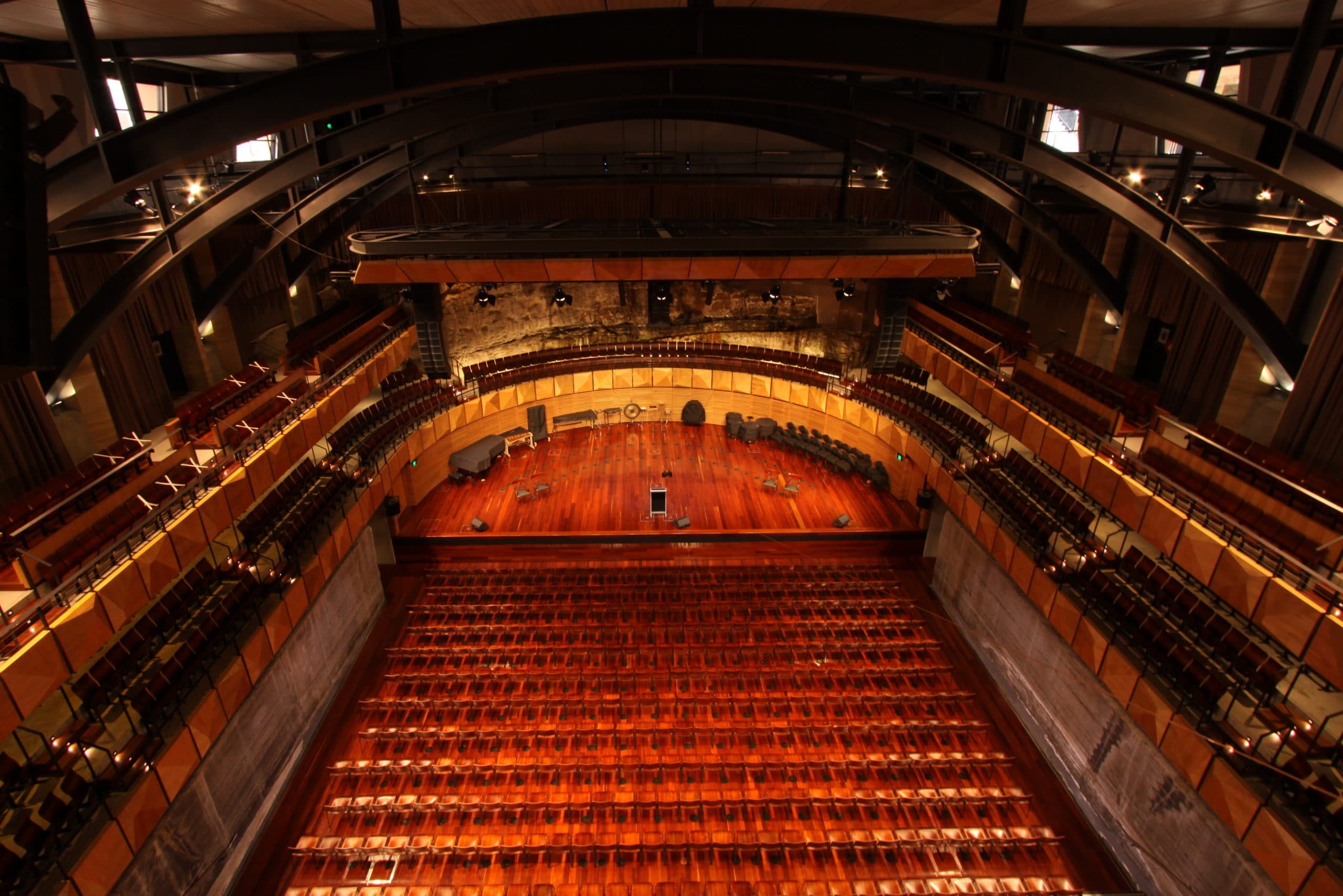 Performance venue with integrated audio, vision and stage systems